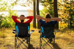 two-guys-sitting-on-a-camping-chair